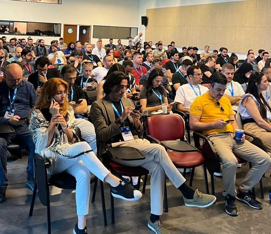 Community members mingling and networking during CNCF Istanbul event break